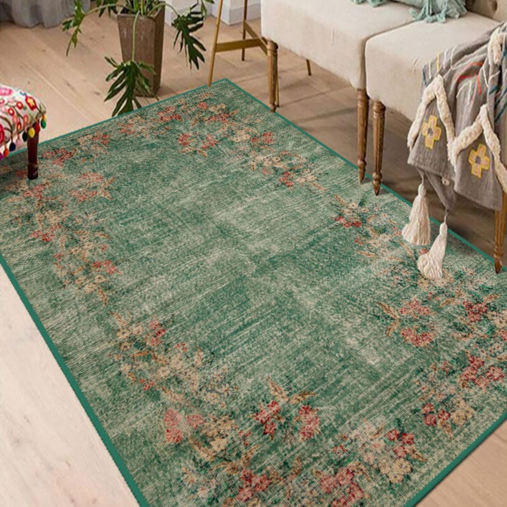 Green Antique Look Rug with vintage-inspired design in a classic living room.