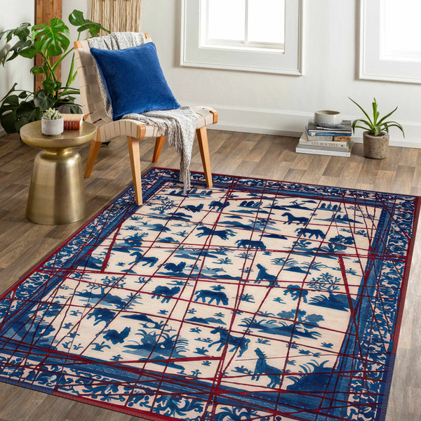 Room interior with a patterned rug, chair, and small table.