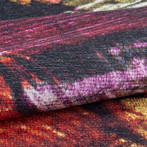 Artistic Splash Rug with vibrant abstract splashes in a modern living room