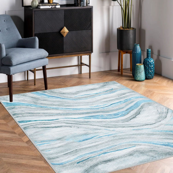Blue Marble Rug with a flowing, marble-inspired design in a modern living room