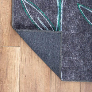 Close-up of Botanical Bliss Rug’s botanical design and low-profile pile.