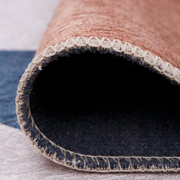 Close-up of the Chic Modern Art Rug’s colorful pattern and low-profile pile.