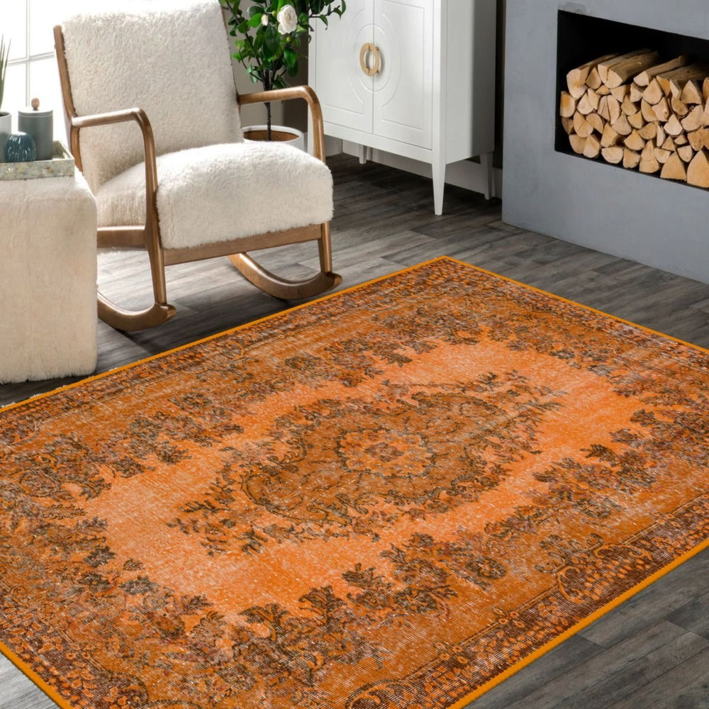 Retro Orange Rug with bold orange color and vintage pattern in a modern living room