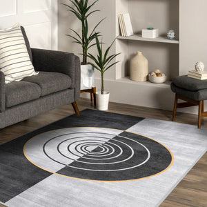 Concentric circles design rug creating a striking visual effect in a minimalist room