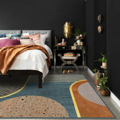 Detailed shot of a vibrant bedroom abstract rug showcasing its unique design