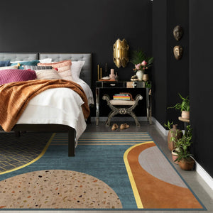 Detailed shot of a vibrant bedroom abstract rug showcasing its unique design