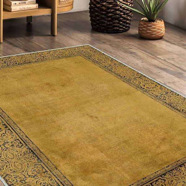 Detailed view of a yellow runner rug with quality cotton and vibrant color