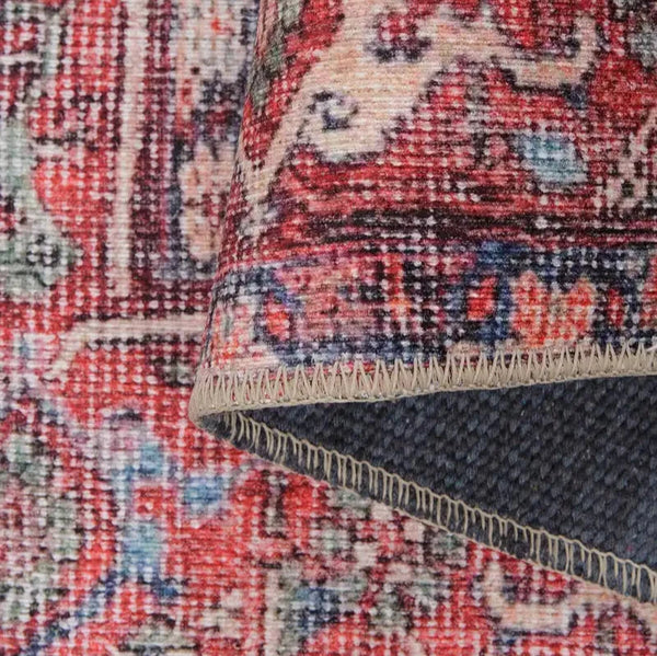 Detailed view of the intricate patterns and vibrant colors on an Oriental Persian Rug