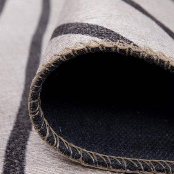 Elegant Interiors Rug with intricate design in a classic living room.