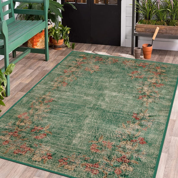 Green Antique Look Rug with vintage-inspired design in a classic living room.