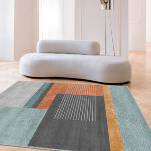 Modern geometric rug adding bold patterns and comfort to a minimalist bedroom