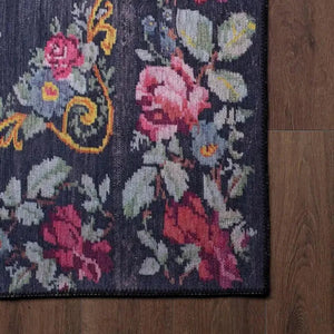 Moldovian Black Rug in an elegant entryway, providing a welcoming and bold decor statement