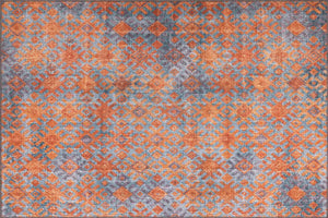 Orange & Blue Rug adding a burst of color to a chic office spac