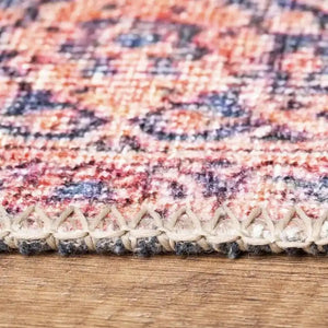 Pink Persian rug in a bedroom, adding warmth and style to the space.