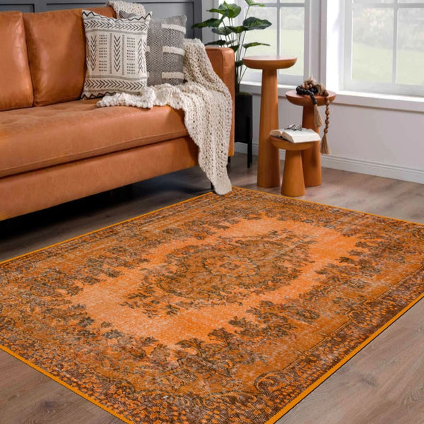 Retro Orange Rug with bold orange color and vintage pattern in a modern living room