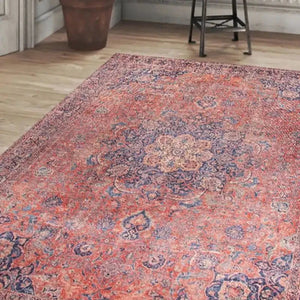 Soft pink Persian rug with elegant patterns in a contemporary living room