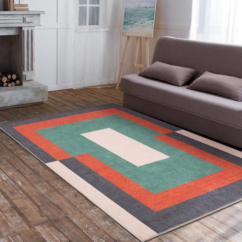 Unique Abstract Rug with vibrant colors and abstract patterns in a modern living room.