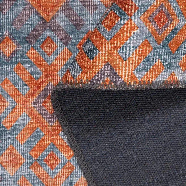 Vibrant Orange & Blue Rug in a modern living room setting
