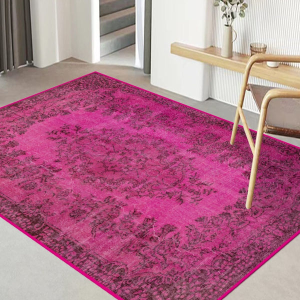 Vibrant Pink Rug with bold color in a modern living room.